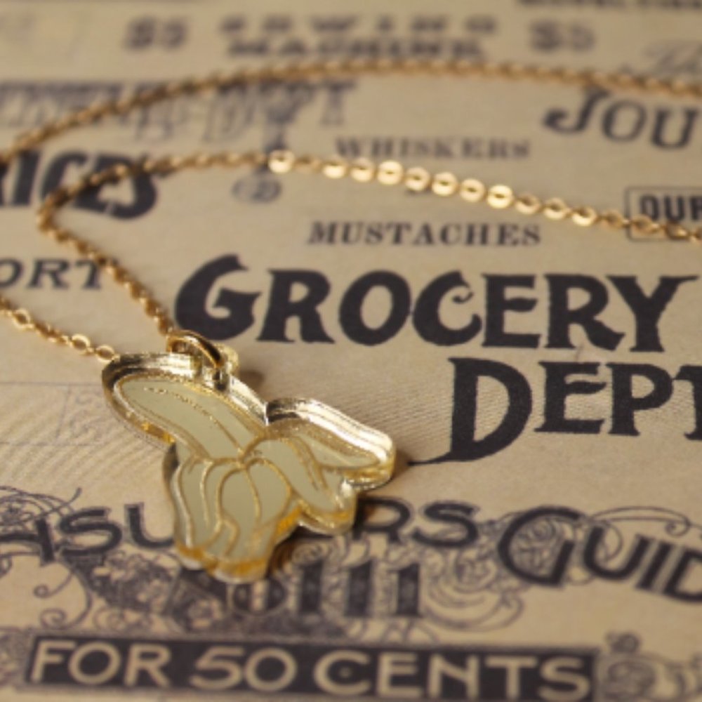 Banana Necklace Gold Acrylic Pendant with 18 inch Gold Chain.